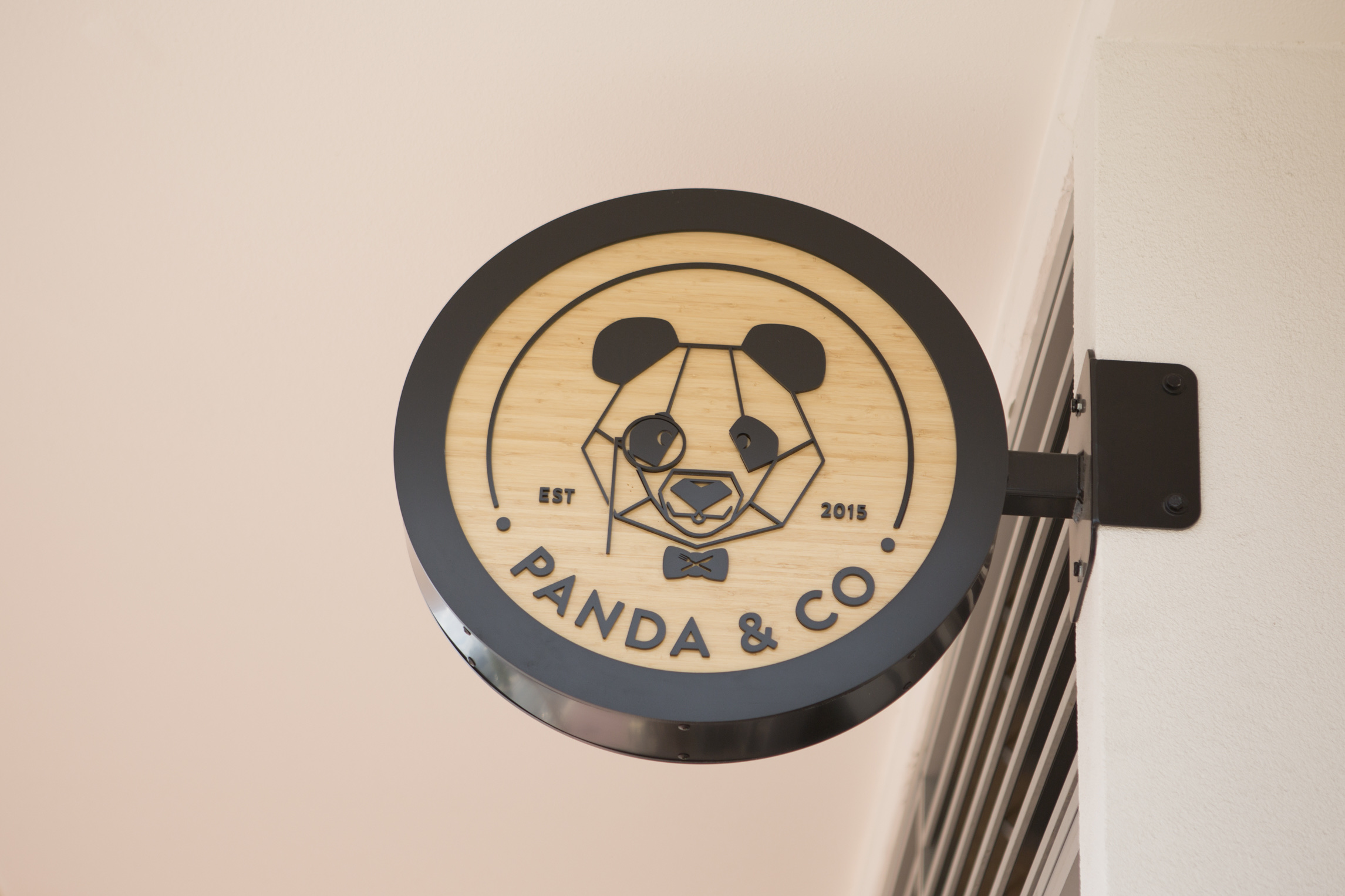 The Panda and Co storefront, wordmark on the sign that's been there ten years.